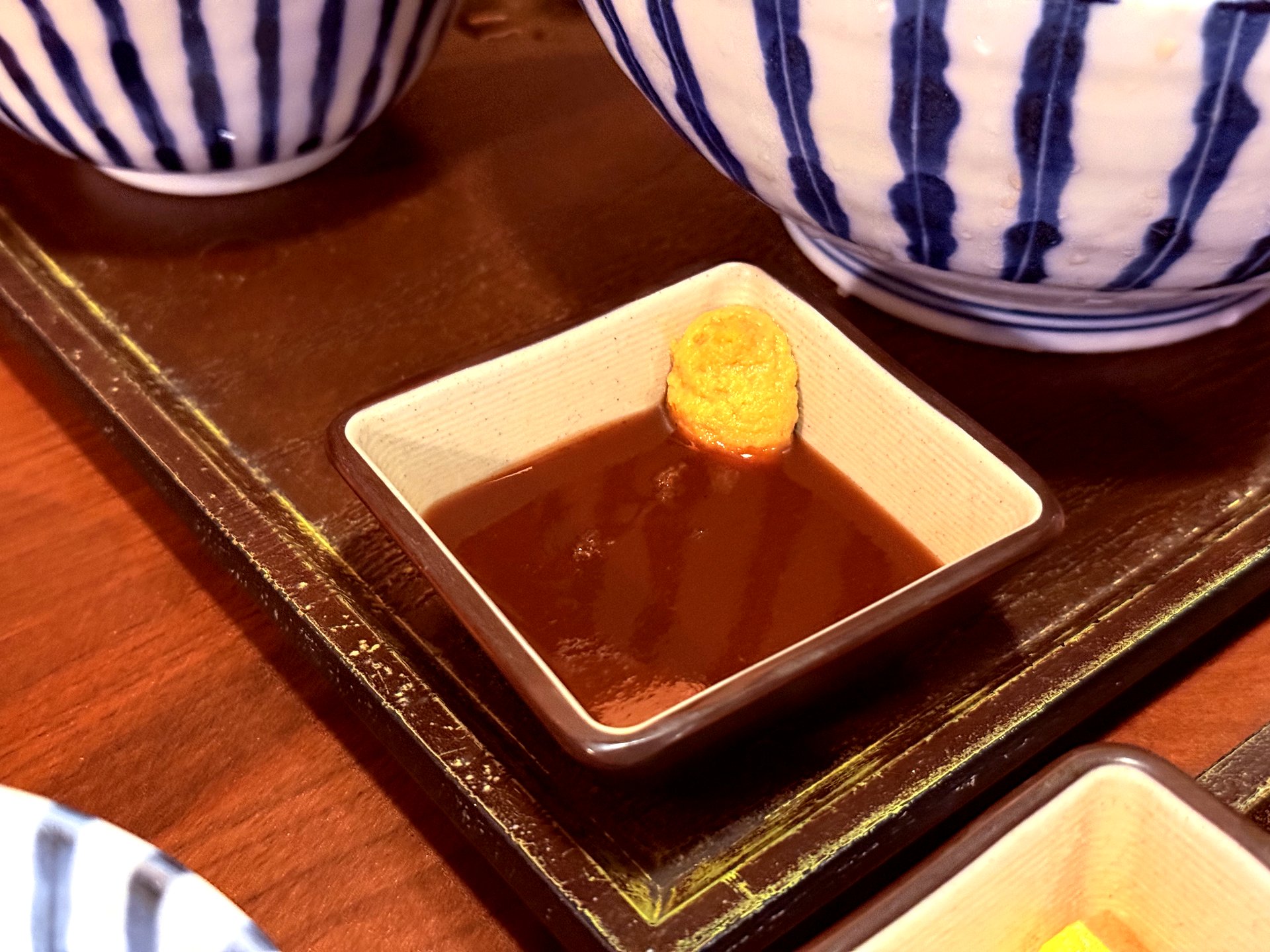 Mustard on tonkatsu sauce — signature local trick at Basak