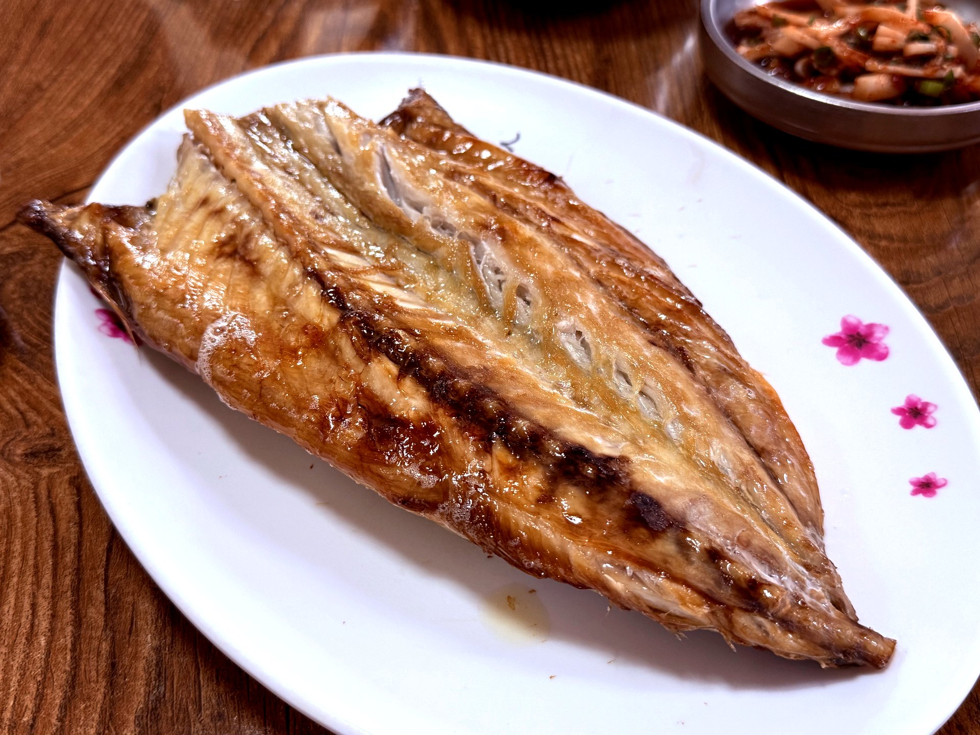 Whole marinated grilled mackerel