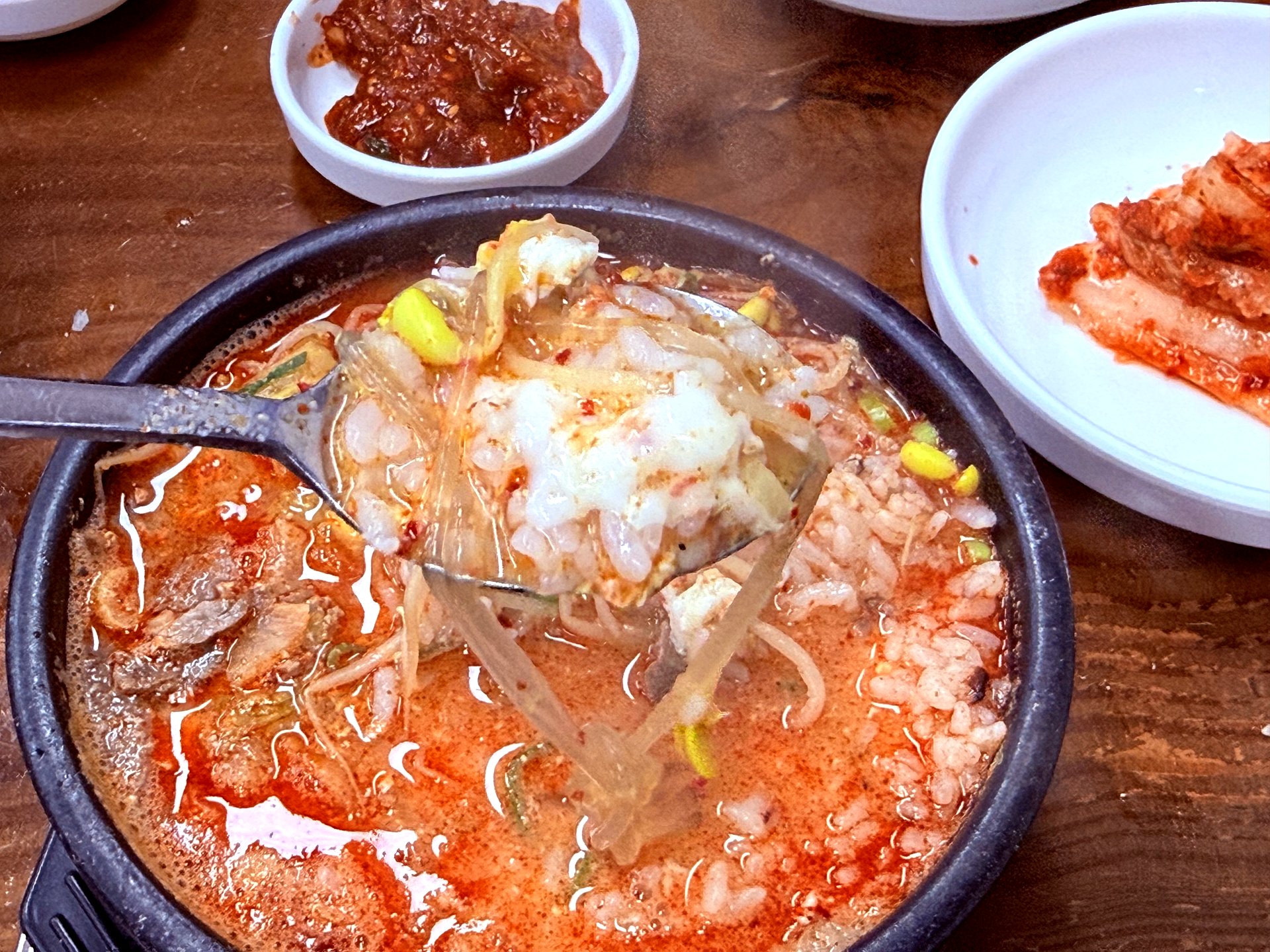 Rice mixed into the broth, the perfect spoonful