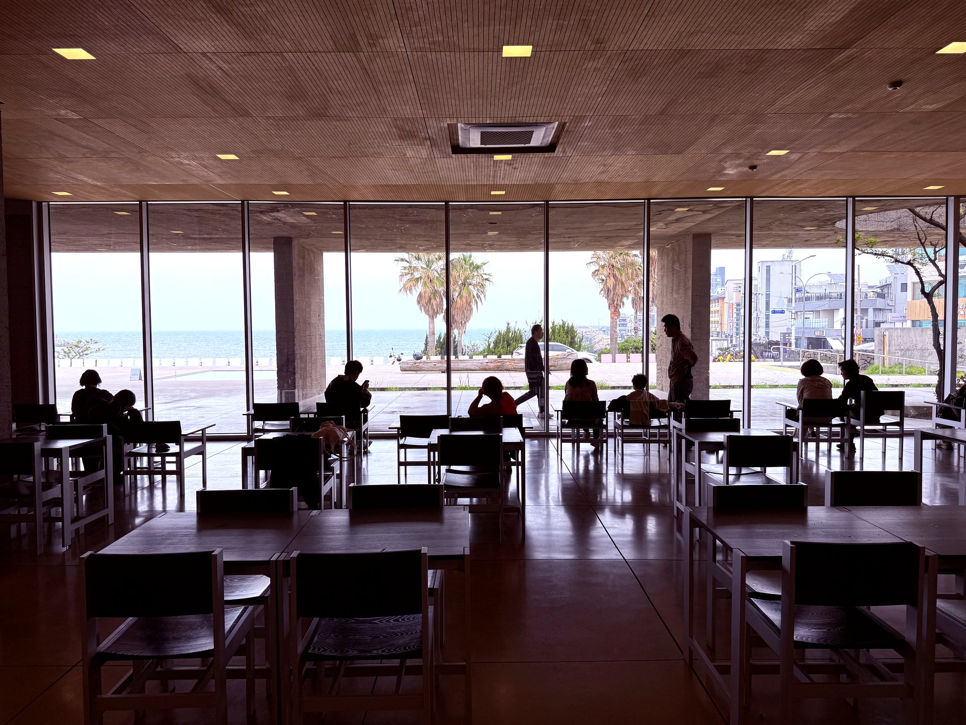 Interior with floor-to-ceiling windows and ocean view