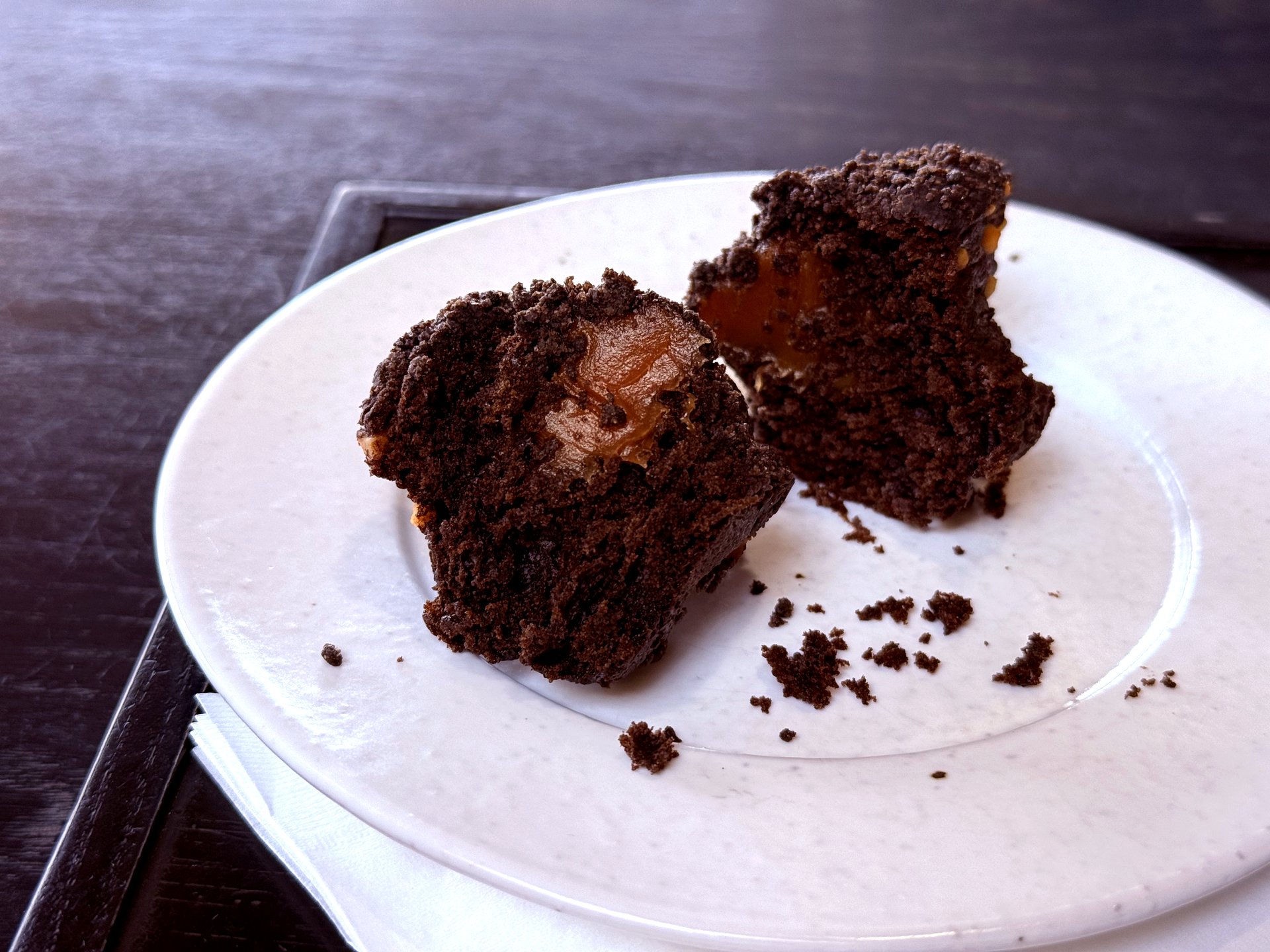 Volcanic madeleine cut open showing molten caramel center