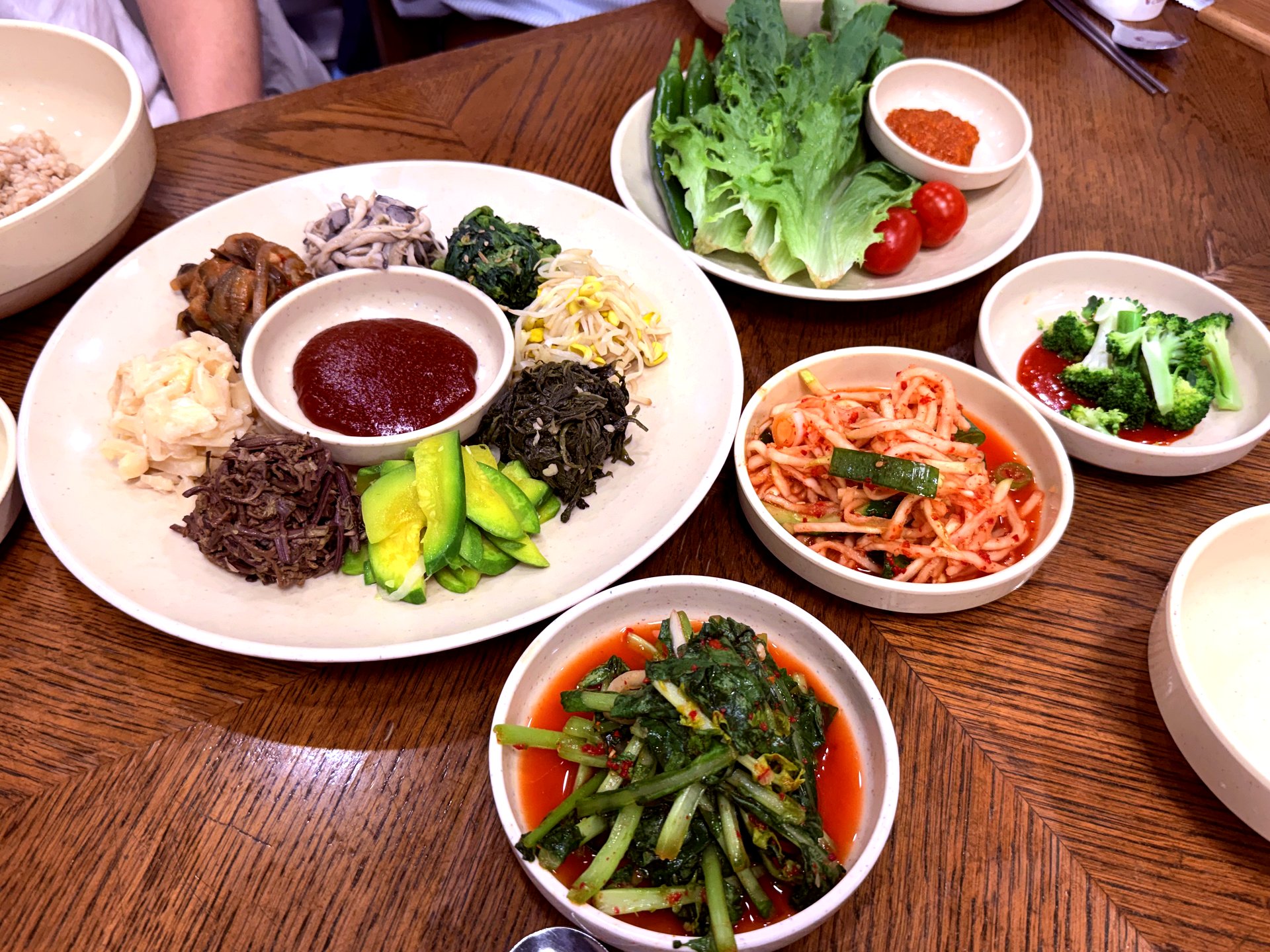 Full table setup - namul platter with side kimchi and lettuce wraps
