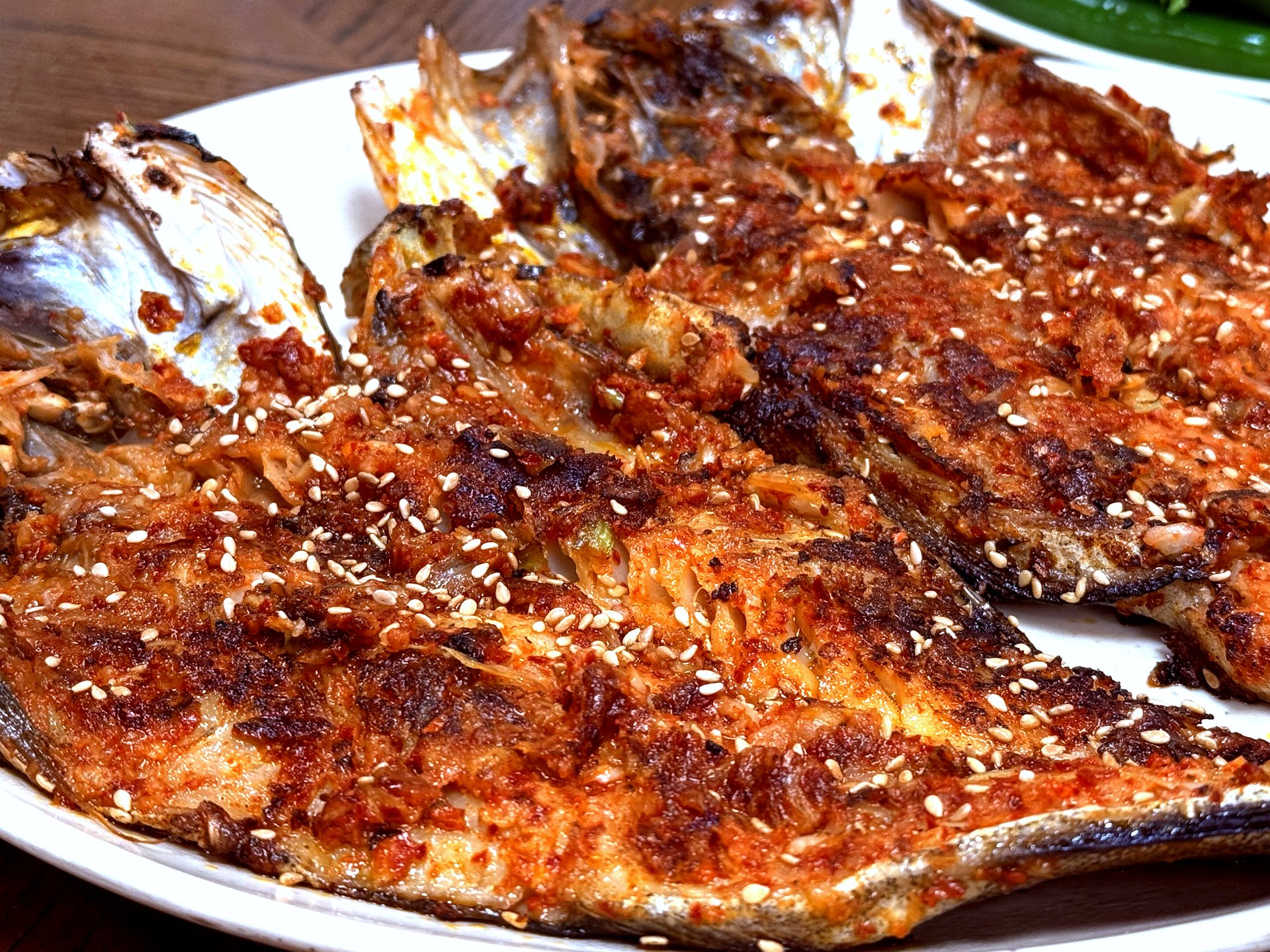 Kodari close-up - caramelized chili crust and sesame
