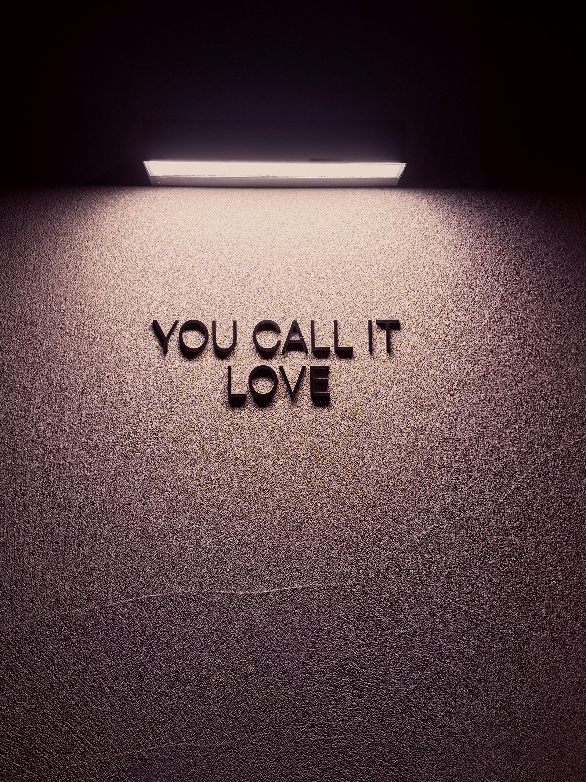 YOU CALL IT LOVE wall signage