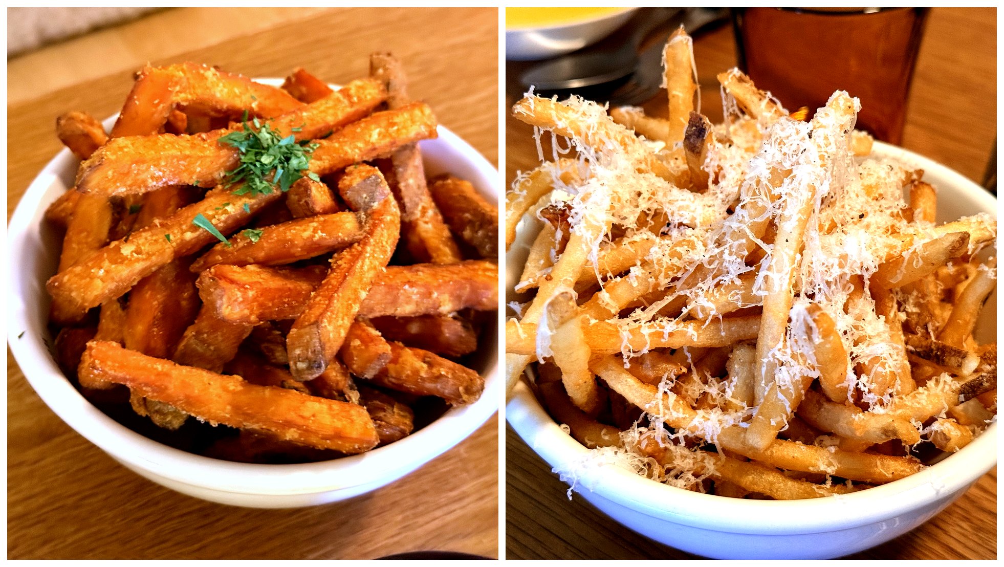 Two bowls of fries at Komvaak side by side - on the left, bright orange crisp sweet-potato fries dusted with sugar and parsley; on the right, thin golden shoestring fries buried under a heavy layer of finely grated parmesan cheese